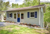 Exterior of small grey home