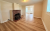 Living Room with fireplace and hardwood floors