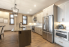 Kitchen with stainless appliances and large island