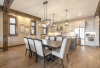 DIning are with kitchen in background stainless appliances