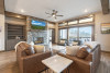 Living Area with leather couches and coffee table
