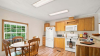 Kitchen with ear in dining area and large picture window