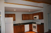 kitchen with appliances and cherry wood cabinets