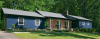 Image of a Brick house with blue trim