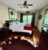 Bedroom with large bed and dresser
