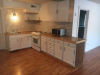 Kitchen with white cabinets and appliances