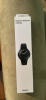 Sealed box with image of watch 