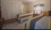 Bedroom with two small beds 