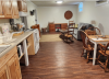 Living area and galley kitchen with eat in table