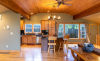 Great room with kitchen and large windows